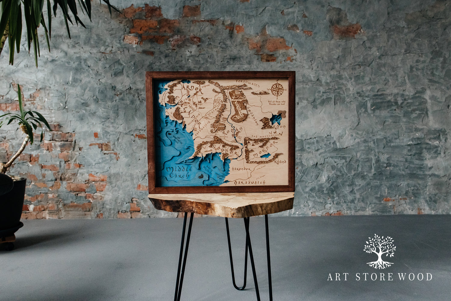 Detailed engraving on Middle Earth map showing rivers, mountains and iconic landmarks