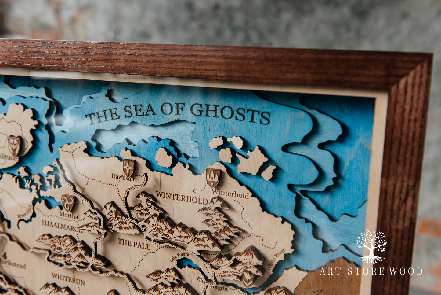 Engraved map of Skyrim highlighting Whiterun, Winterhold and The Reach