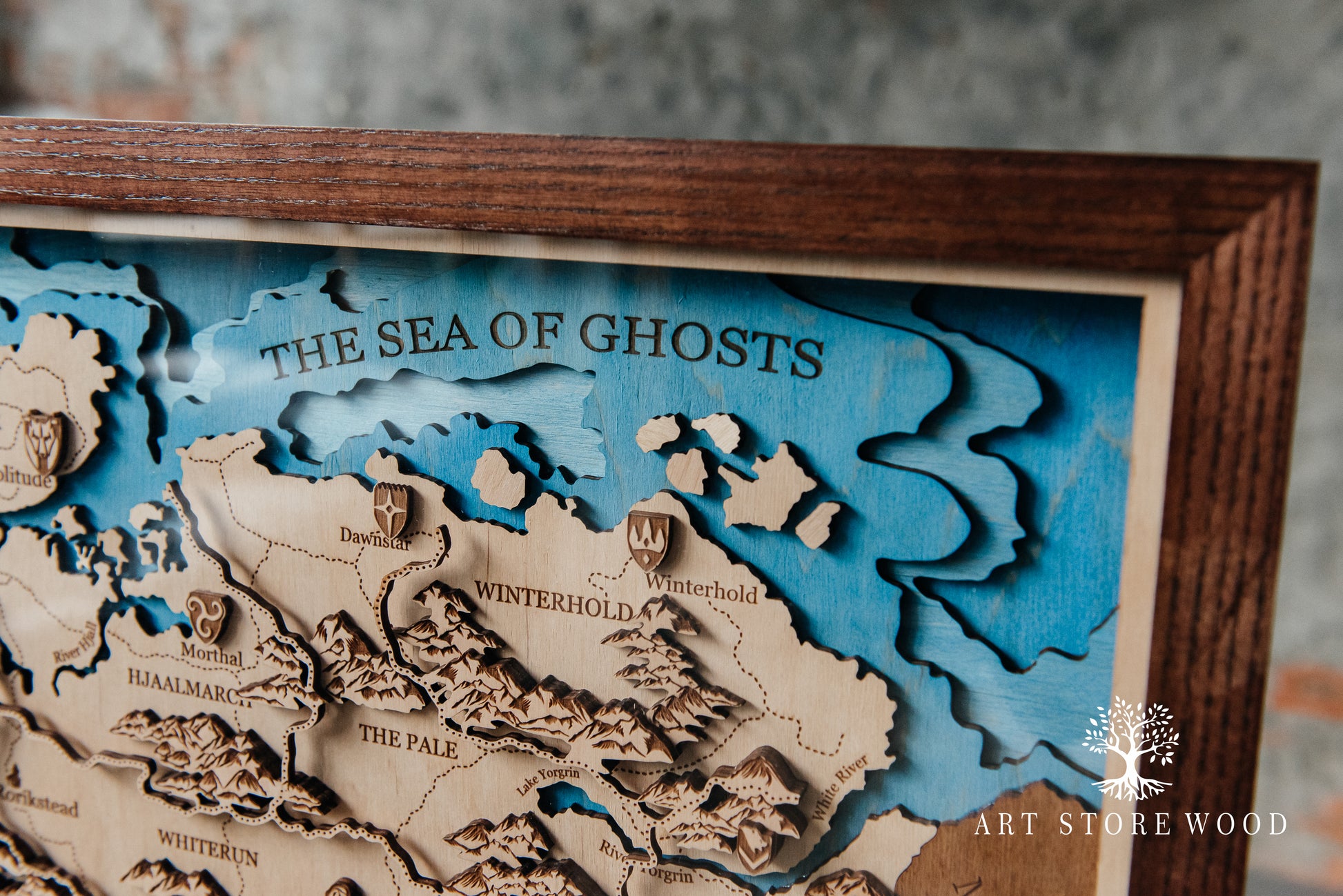 Engraved map of Skyrim highlighting Whiterun, Winterhold and The Reach