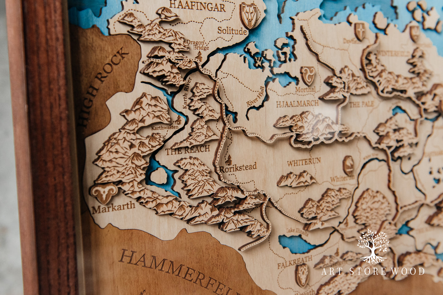 Detailed engraving on Skyrim map showing mountains and rivers of Skyrim