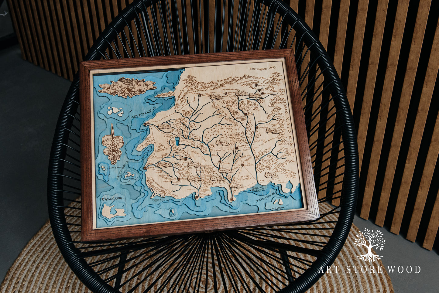 Interior shot – The Wheel of Time 3D wooden map mounted in a game room décor